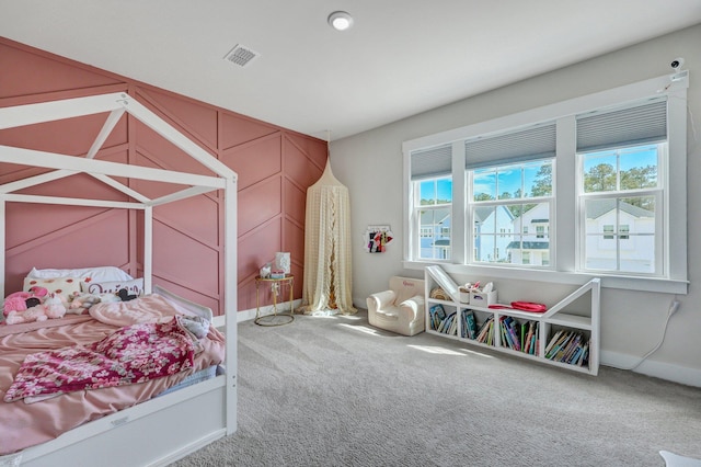 bedroom featuring carpet flooring, baseboards, and visible vents