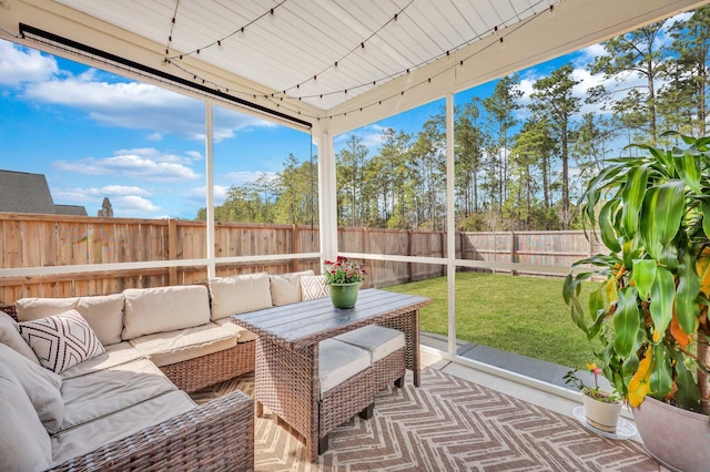 sunroom with track lighting