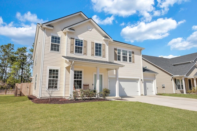 view of front of home featuring a garage, driveway, a front yard, and fence