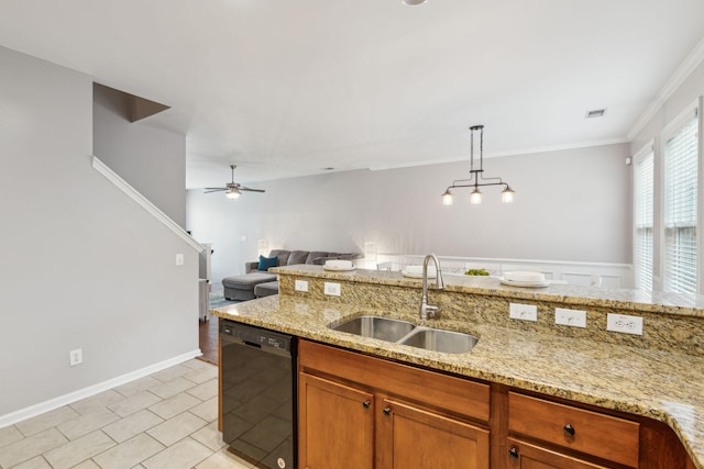 kitchen with light stone counters, a sink, pendant lighting, dishwasher, and open floor plan