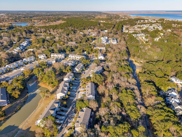 bird's eye view with a residential view and a water view