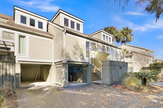 view of front of property with a carport