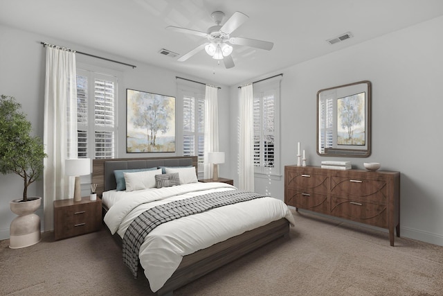 carpeted bedroom featuring ceiling fan