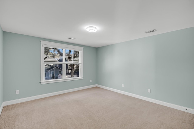 view of carpeted spare room