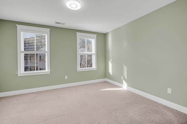 view of carpeted spare room