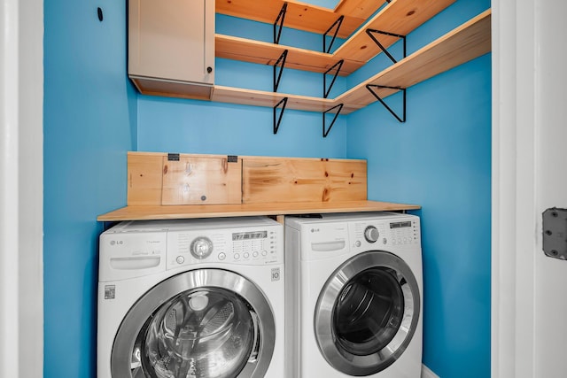 washroom featuring separate washer and dryer