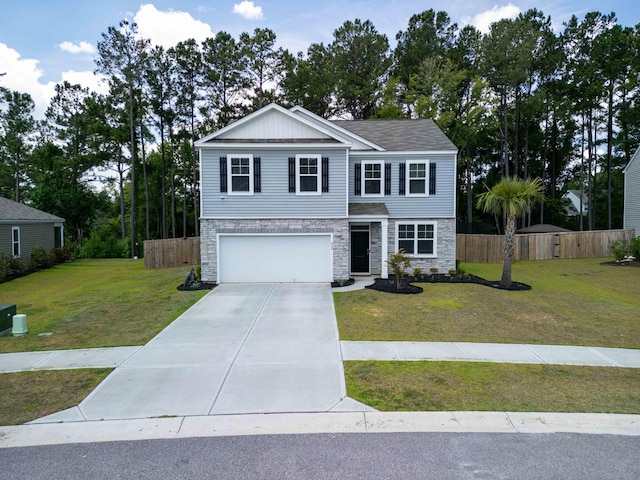 view of front of house with a garage and a front lawn