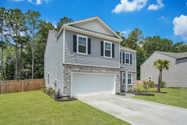 view of front of home with a garage and a front lawn