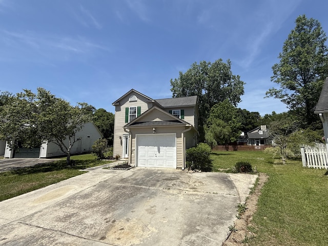 view of home's exterior with a yard, an attached garage, fence, and concrete driveway