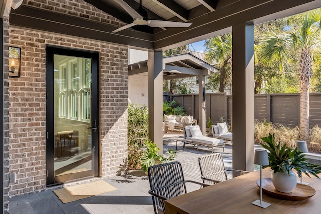 view of patio / terrace with an outdoor hangout area and ceiling fan