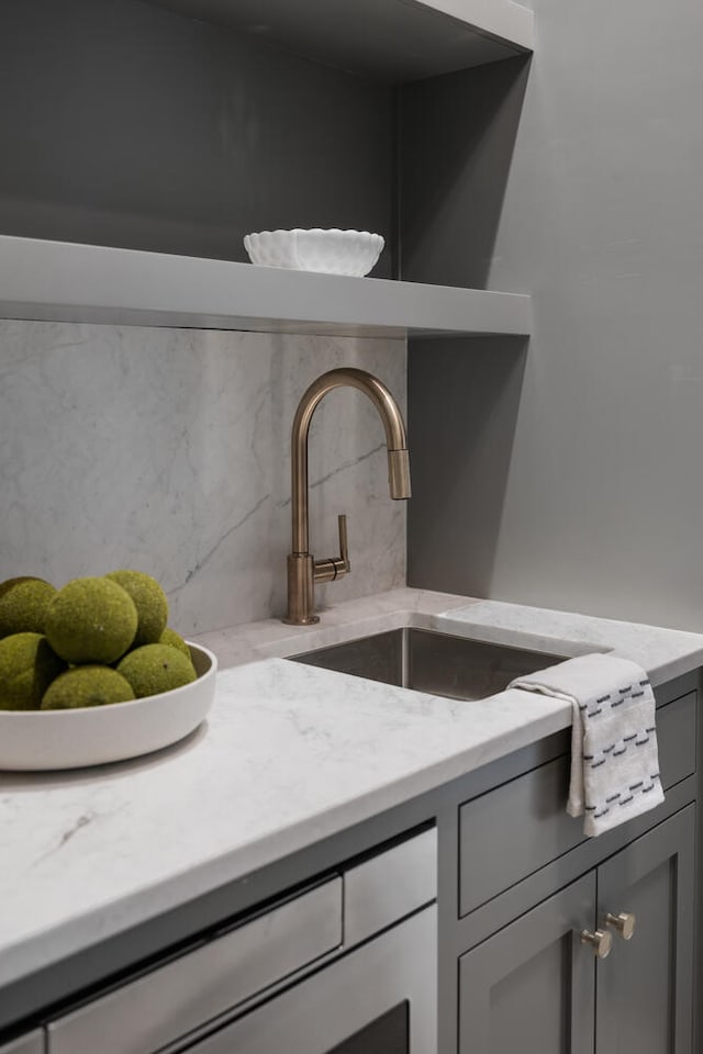 details with tasteful backsplash and sink