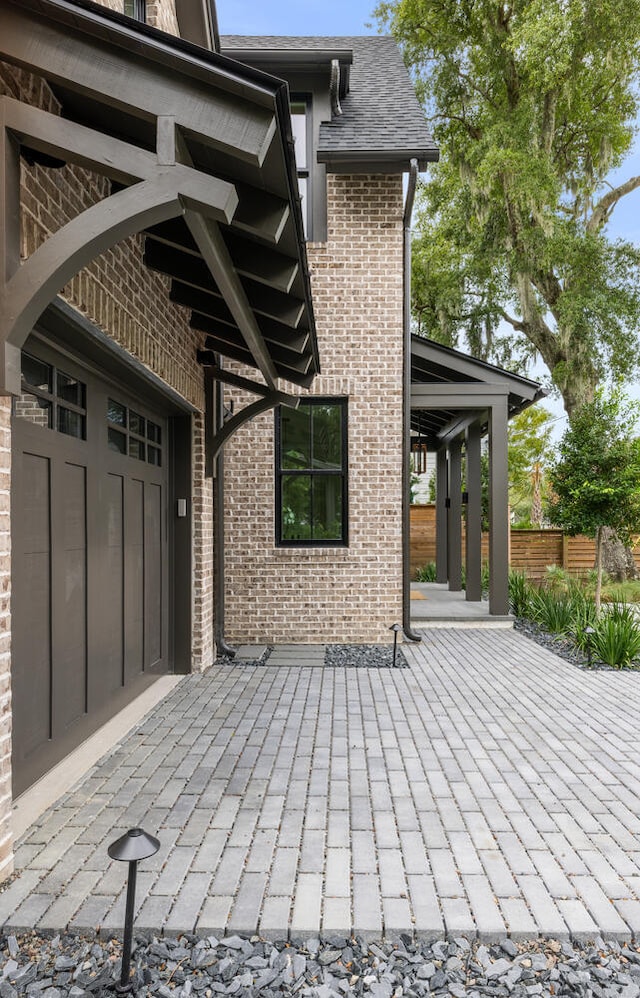 view of patio featuring a garage