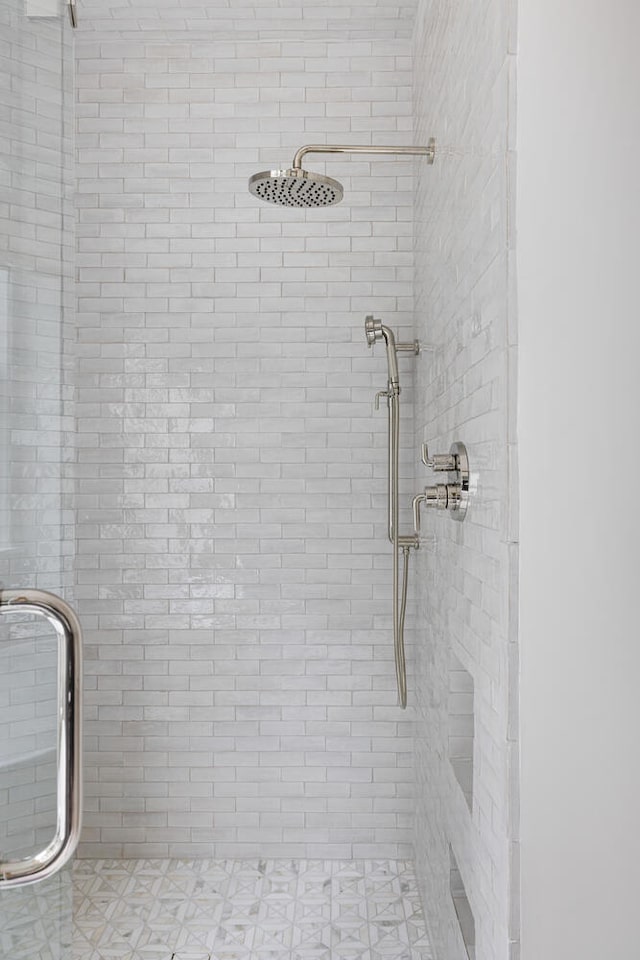 bathroom with an enclosed shower