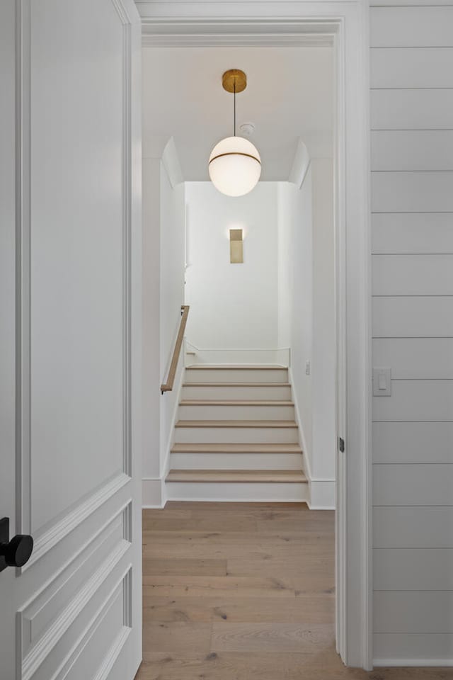 stairway featuring hardwood / wood-style floors