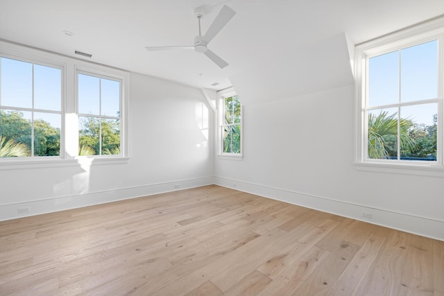 spare room featuring ceiling fan and light hardwood / wood-style floors