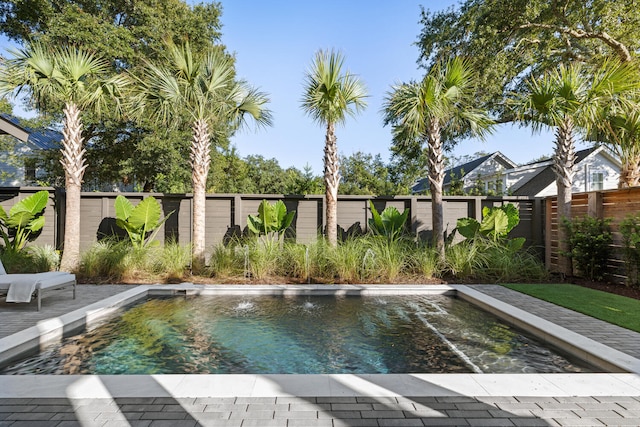 view of swimming pool featuring pool water feature