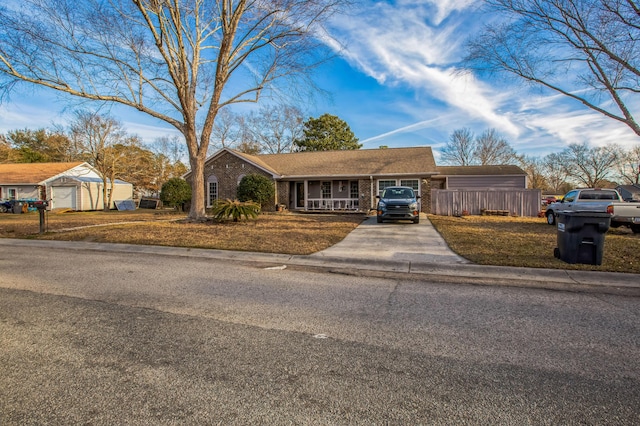 single story home featuring a porch