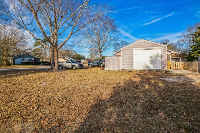 view of yard featuring a garage