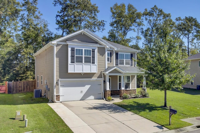 craftsman house featuring a front yard, a garage, and central AC