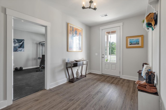 4631 Scout Aly, North Charleston, SC 29405 - entrance foyer with wood finished floors, a chandelier, and baseboards