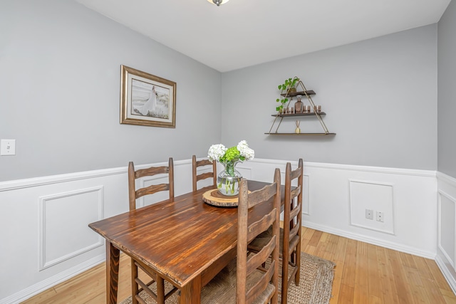 dining area with light wood-type flooring