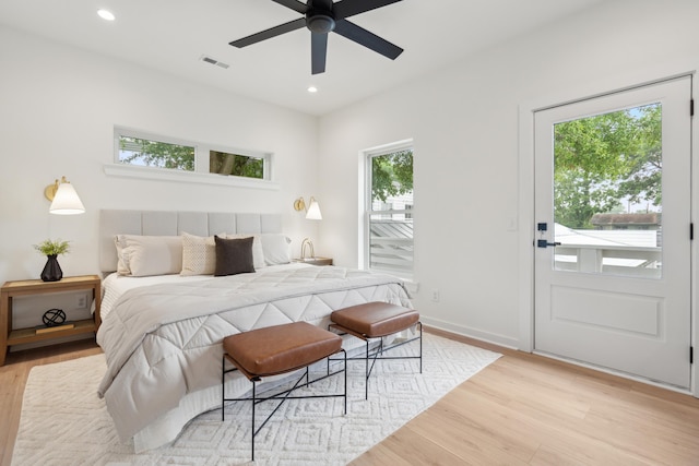 42 Poinsett St Unit B, Charleston, SC 29403 - bedroom with access to exterior, light wood-style flooring, recessed lighting, ceiling fan, and baseboards