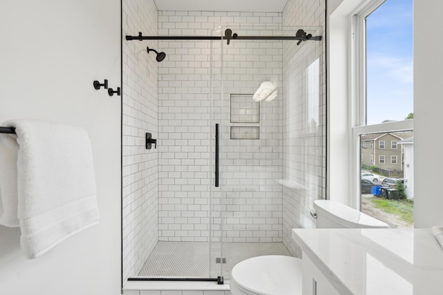 42 Poinsett St Unit B, Charleston, SC 29403 - full bathroom with a shower stall, toilet, healthy amount of natural light, and vanity