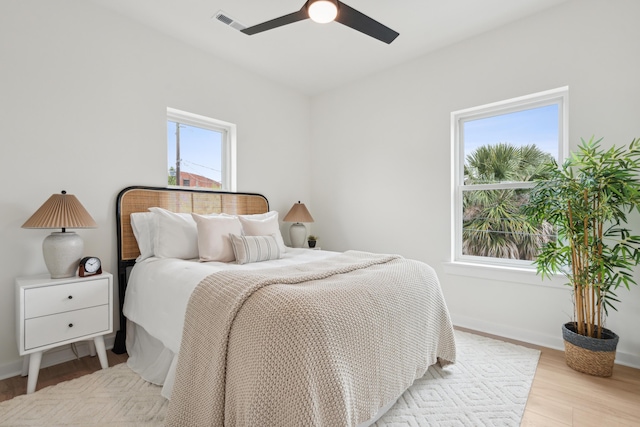 42 Poinsett St Unit B, Charleston, SC 29403 - bedroom featuring wood finished floors, baseboards, and ceiling fan