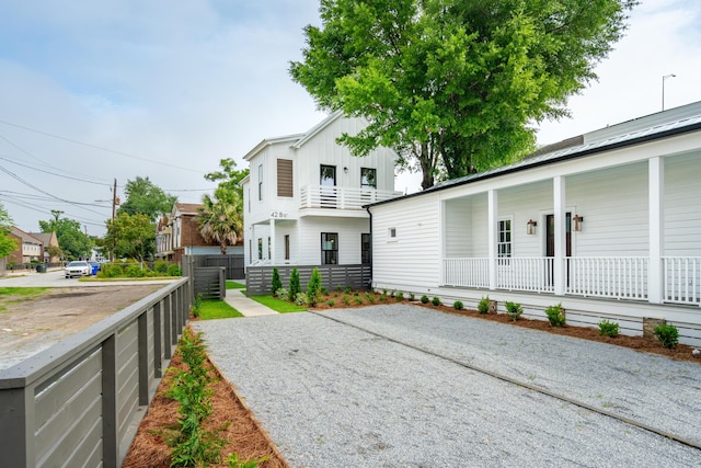 42 Poinsett St Unit B, Charleston, SC 29403 - view of front of house featuring board and batten siding and covered porch