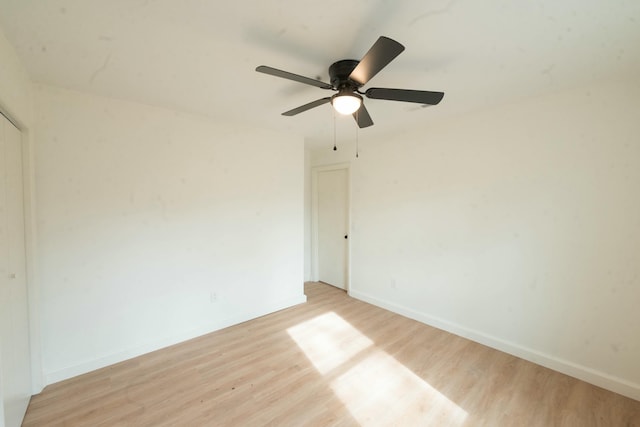 unfurnished room featuring ceiling fan and light hardwood / wood-style flooring