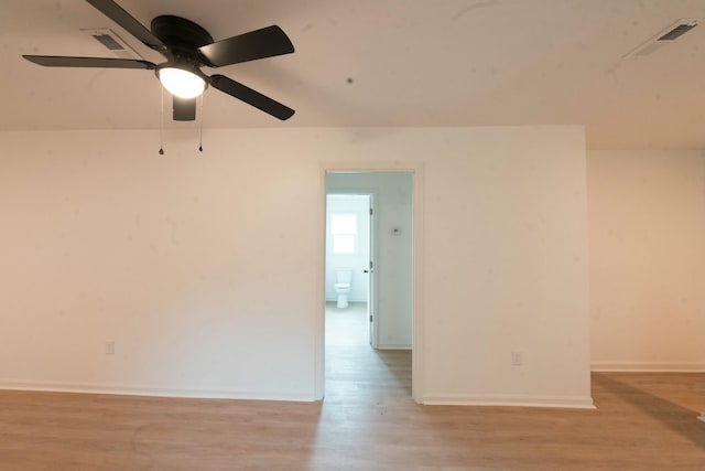 unfurnished room featuring ceiling fan and light hardwood / wood-style flooring