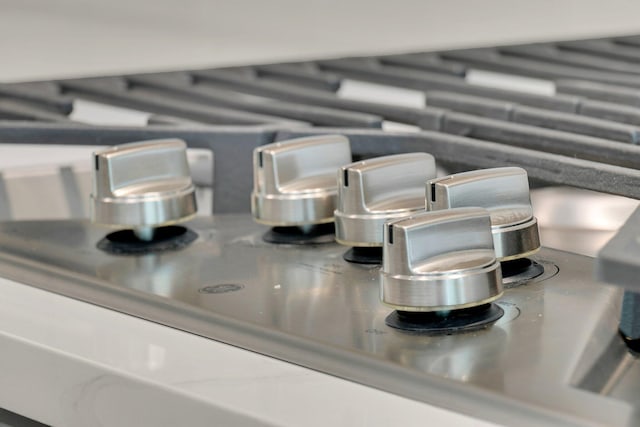 interior details featuring stainless steel stovetop