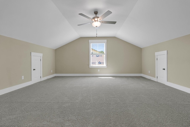 bonus room featuring carpet, lofted ceiling, and ceiling fan