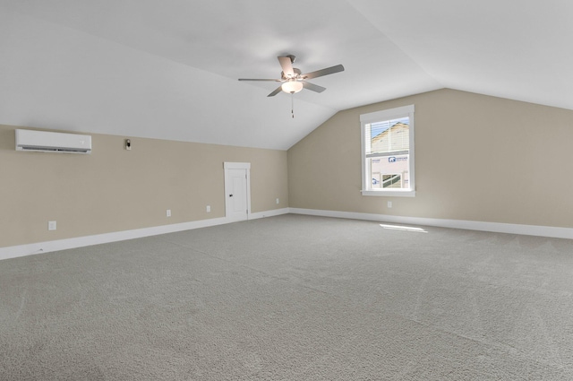 bonus room featuring carpet, lofted ceiling, an AC wall unit, and ceiling fan