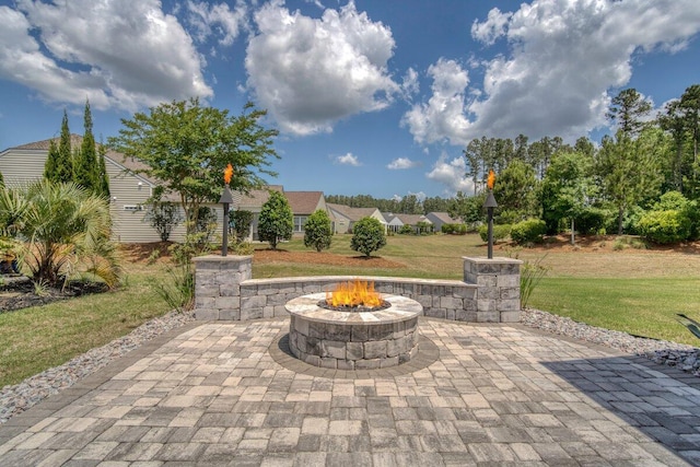 view of patio / terrace with an outdoor fire pit