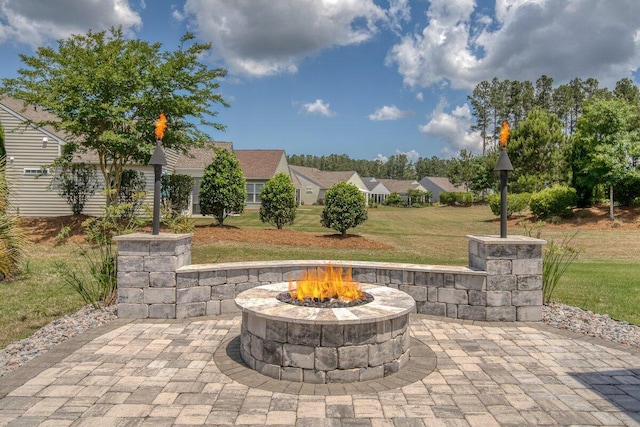 view of patio / terrace featuring an outdoor fire pit