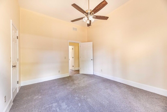 1165 Cleveland St, Elloree, SC 29047 - carpeted empty room with a ceiling fan, high vaulted ceiling, and baseboards