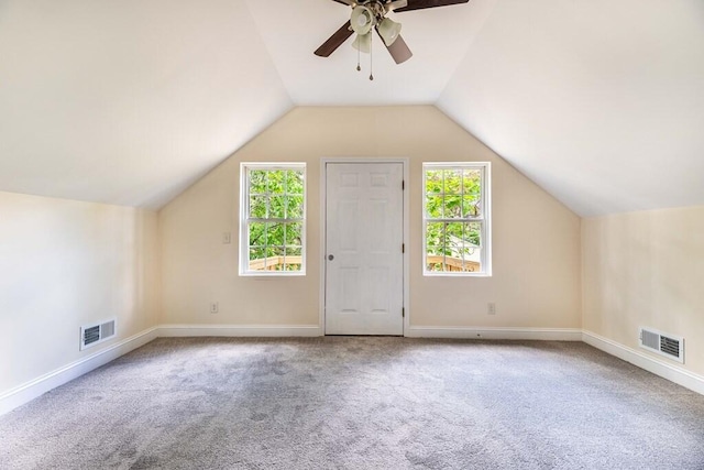 1165 Cleveland St, Elloree, SC 29047 - bonus room with carpet floors, ceiling fan, baseboards, and vaulted ceiling
