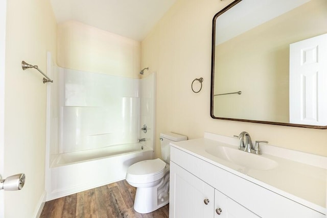 1165 Cleveland St, Elloree, SC 29047 - bathroom featuring vanity, toilet,  shower combination, and wood finished floors