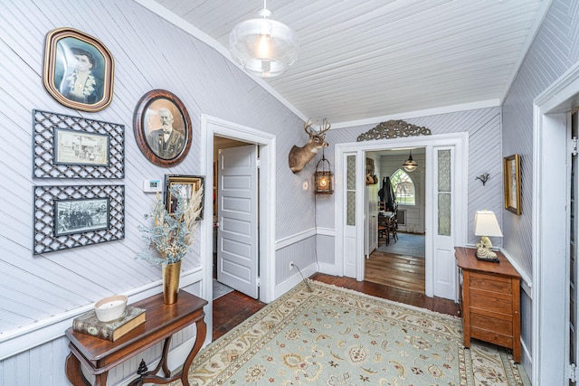 hall featuring crown molding and wood finished floors