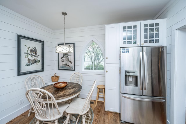 dining area featuring dark wood finished floors