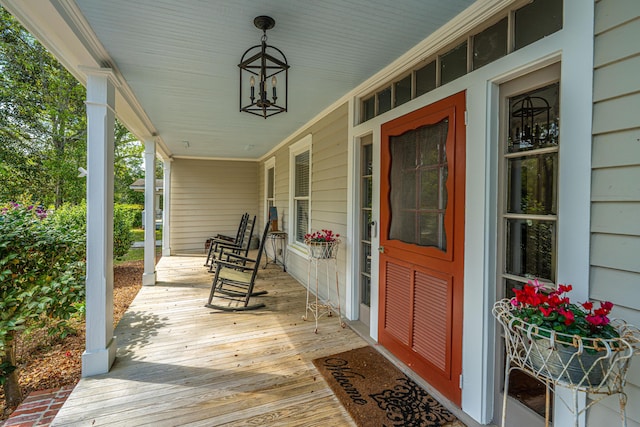 wooden terrace featuring a porch