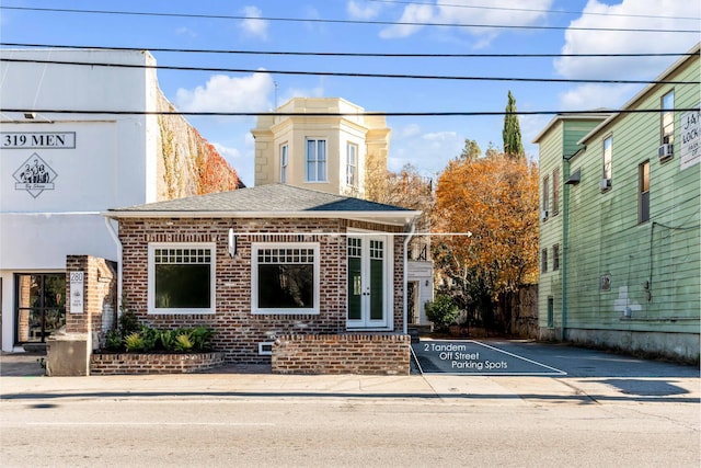 view of front facade featuring french doors