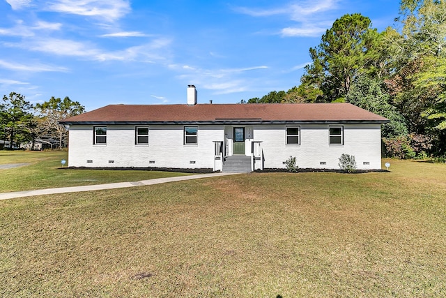 single story home featuring a front yard