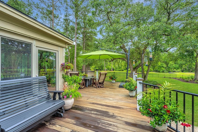 deck featuring a yard