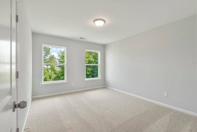 view of carpeted spare room