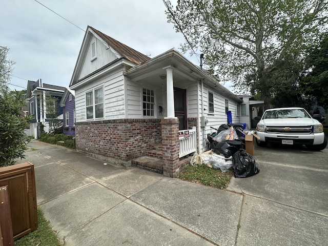 227 Fishburne St, Charleston, SC 29403 - view of front facade featuring brick siding
