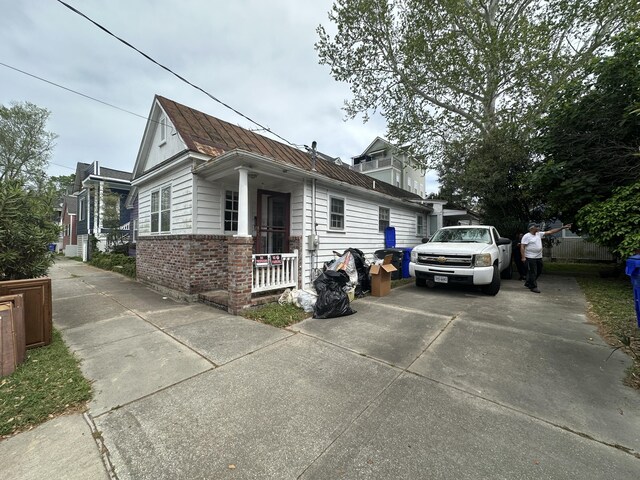 227 Fishburne St, Charleston, SC 29403 - view of property exterior featuring brick siding