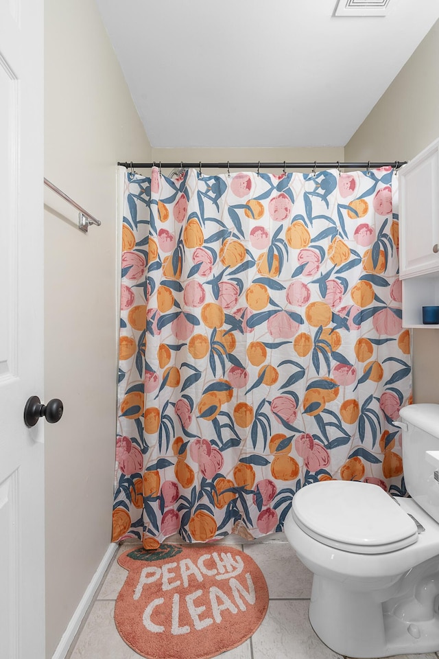 bathroom with visible vents, curtained shower, toilet, and tile patterned floors