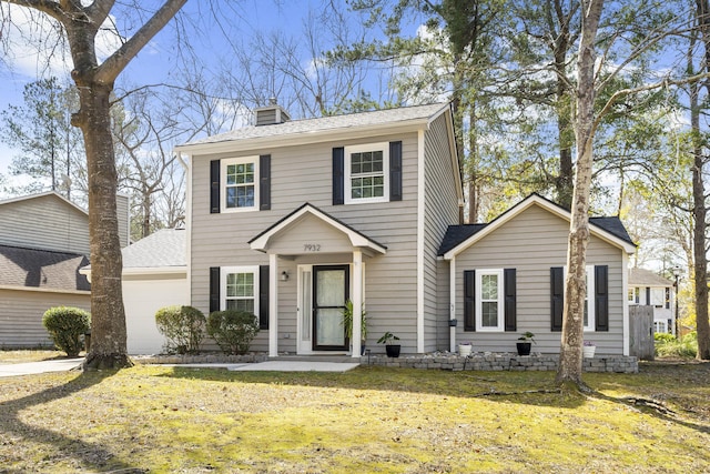 view of front of property featuring a garage, a shingled roof, a chimney, and a front lawn